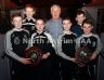 North Antrim Treasurer Chris Campbell with All Saints players who received the North Antrim U12 B Championship and TeamKit U12 Airborne Division 2