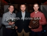 North Antrim Secretary Frank McCarry presents the Junior Feis Cup to Sean Ward (left) and North Antrim Junior Hurler of the Year award to Darren Hamill of Glenarm