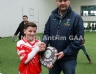 North Antrim Youth Development Officer Declan Heggarty presenting Loughgiel Shamrocks captain Connor Dixson with the North Antrim U12 Division 1 Airborne Hurling League Shield.