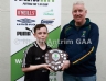 North Antrim Youth Development Officer Paddy Gray presenting All Saints Team Captain Ciaran McQuillan with the TeamKit U12 Division 2 Airborne Hurling League Shield