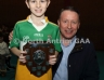 Philip McHendry from Central Restaurant Ballycastle presenting Oisin 1 team captain Canice McIntosh with the North Antrim Central Bar Division 4 Indoor Hurling league shield